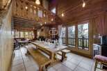 Experience the charm of this rustic chalet, featuring a spacious dining area perfect for gatherings.