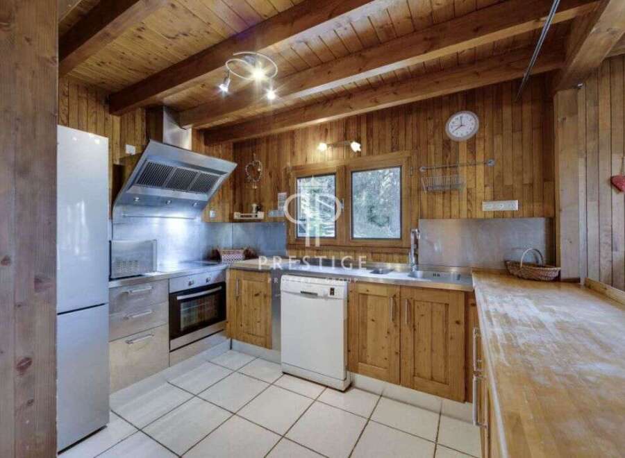 Rustic charm meets modern convenience in this stunning kitchen.