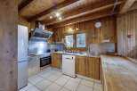 Rustic charm meets modern convenience in this stunning kitchen.