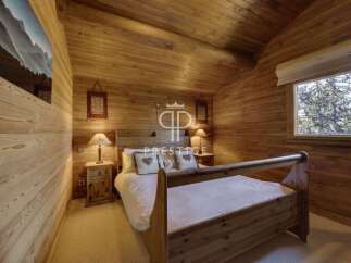 Experience rustic charm in this cozy bedroom.