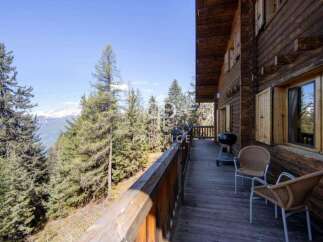 Experience the ultimate mountain retreat in this stunning wooden chalet.