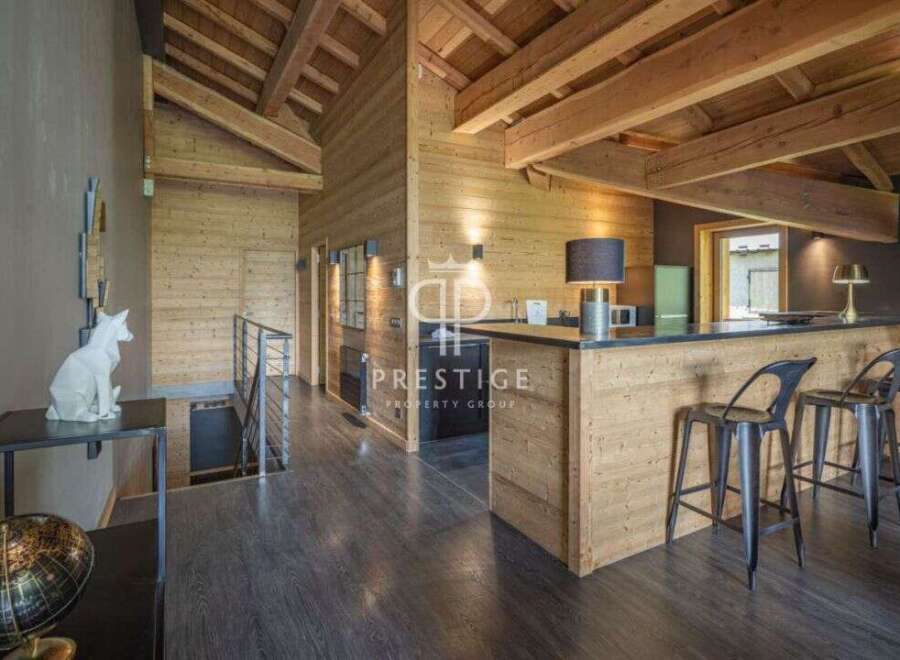 Experience luxury living in this stunning property featuring a modern bar area perfect for entertaining.