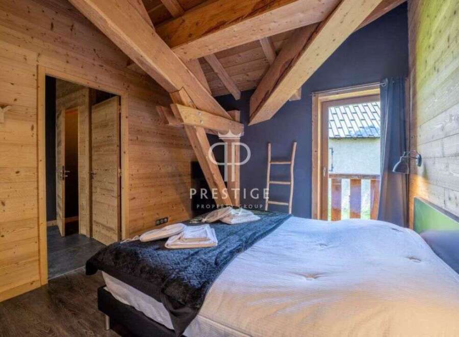 Experience rustic charm in this cozy bedroom.