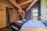 Experience rustic charm in this cozy bedroom.