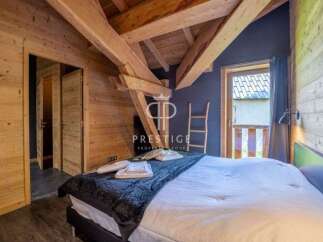 Experience rustic charm in this cozy bedroom.