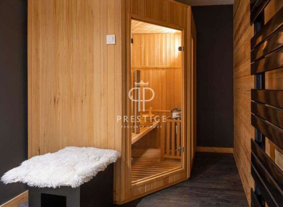 Indulge in ultimate relaxation within this luxurious sauna.