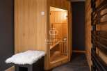 Indulge in ultimate relaxation within this luxurious sauna.