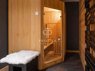 Indulge in ultimate relaxation within this luxurious sauna.