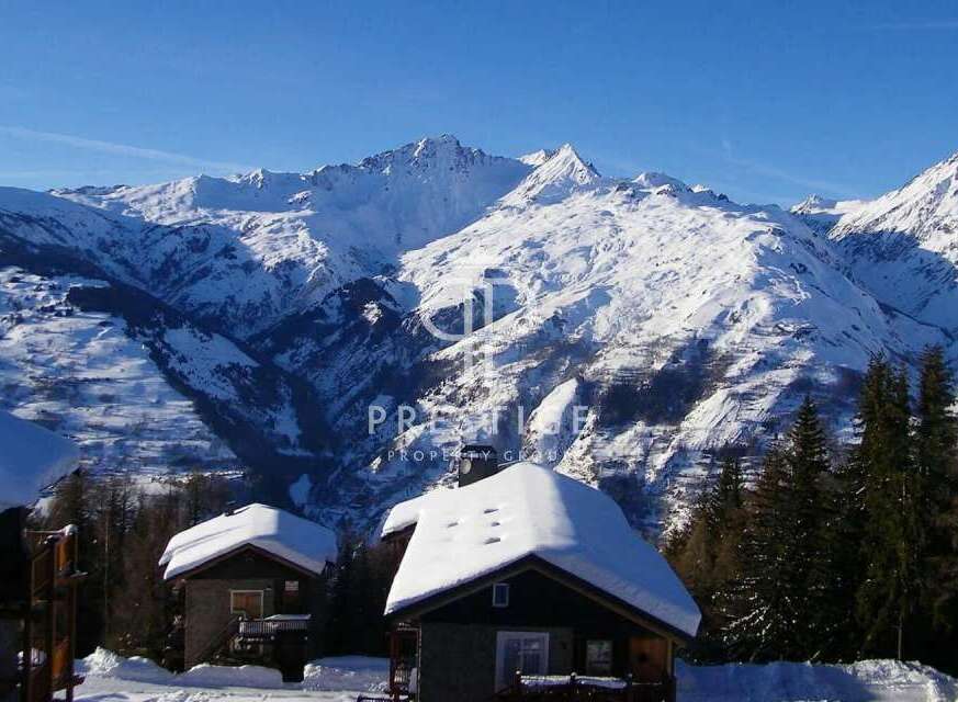 Experience the ultimate winter escape in this stunning mountain property.