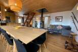 Discover the charm of this stunning property, featuring a spacious dining area perfect for gatherings.