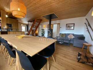 Discover the charm of this stunning property, featuring a spacious dining area perfect for gatherings.