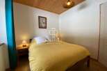 Cozy bedroom with a warm and inviting atmosphere.
