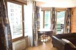 Discover a cozy retreat with stunning views! This property features a charming round table perfect for intimate gatherings.
