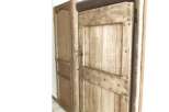 Discover the rustic charm of this property with its unique wooden doors.