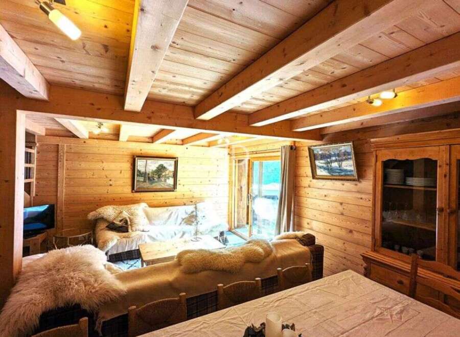 Experience rustic charm in this cozy cabin retreat.