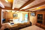 Experience rustic charm in this cozy cabin retreat.