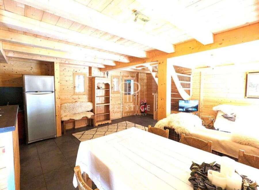 Discover the charm of this cozy wooden cabin, perfect for a relaxing getaway.