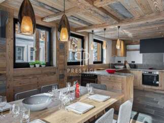 Experience luxury living in this stunning property, featuring a beautifully designed kitchen and dining area.
