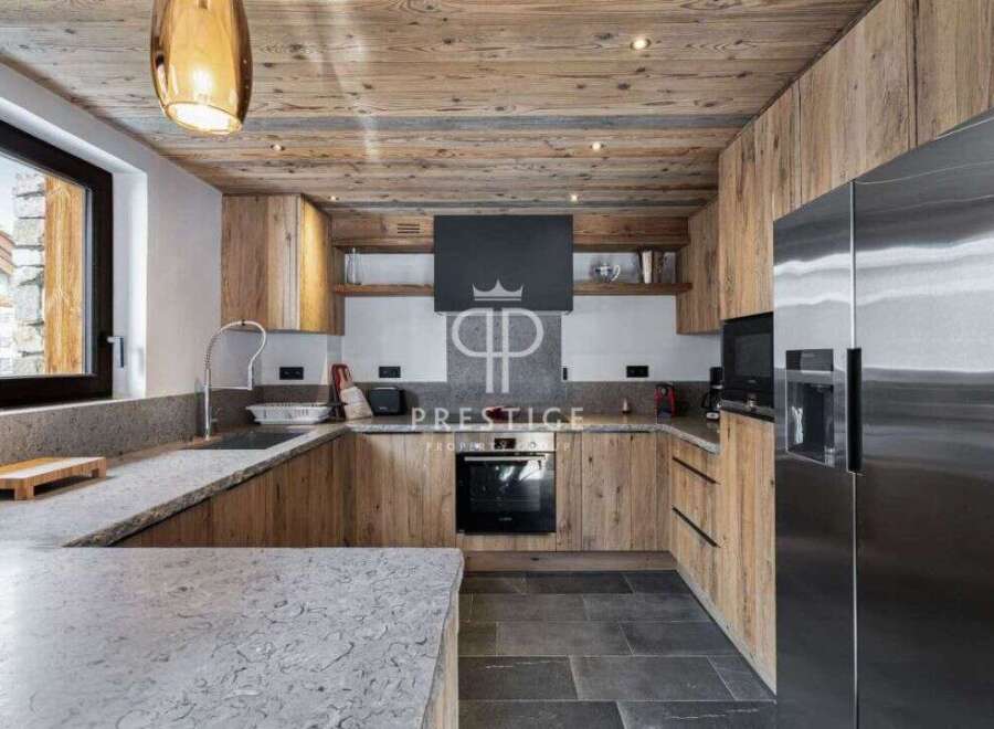 Experience luxury living in this stunning kitchen.
