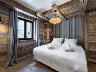 Experience rustic elegance in this stunning bedroom.