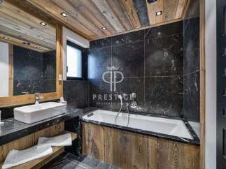 Discover luxury in this stunning bathroom featuring a sleek black marble design.