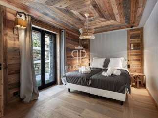 Experience rustic elegance in this stunning bedroom.