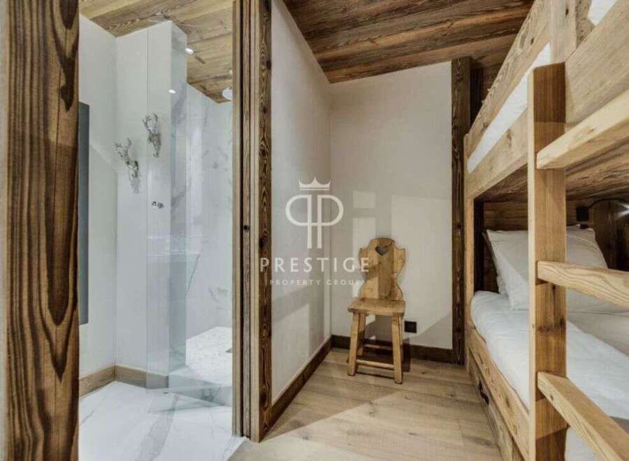 Discover the charm of this property, featuring a cozy bunk bed setup perfect for family or guests.