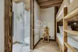 Discover the charm of this property, featuring a cozy bunk bed setup perfect for family or guests.