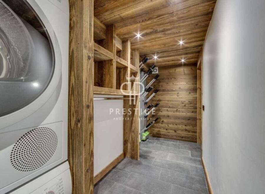Discover luxury living at its finest! This property boasts a stunning wine cellar, perfect for the connoisseur.
