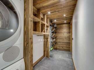 Discover luxury living at its finest! This property boasts a stunning wine cellar, perfect for the connoisseur.