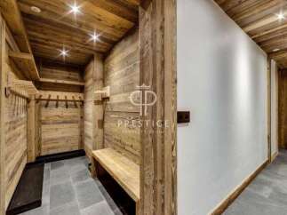 Step into luxury with this stunning property featuring exquisite wooden accents throughout.