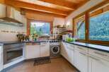 Discover a charming kitchen with stunning mountain views.