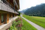 Discover a charming property nestled in a picturesque mountain setting.