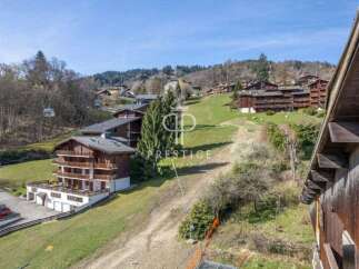 Discover a stunning property nestled in a picturesque mountain setting.