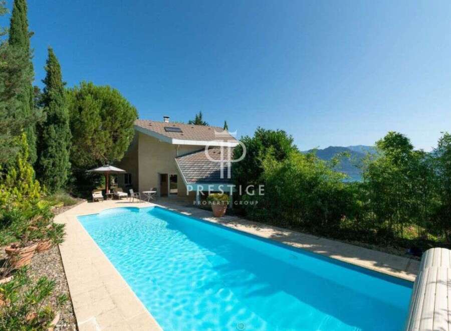 Discover your dream home with this stunning property! Enjoy a refreshing swim in the inviting pool, perfect for relaxation and leisure.