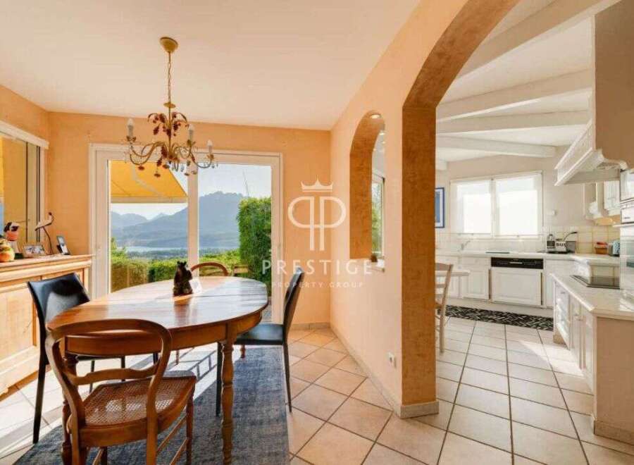 Discover the epitome of elegance in this stunning property, featuring a bright and airy dining area perfect for hosting.