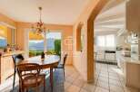 Discover the epitome of elegance in this stunning property, featuring a bright and airy dining area perfect for hosting.