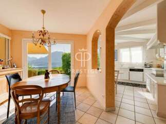 Discover the epitome of elegance in this stunning property, featuring a bright and airy dining area perfect for hosting.