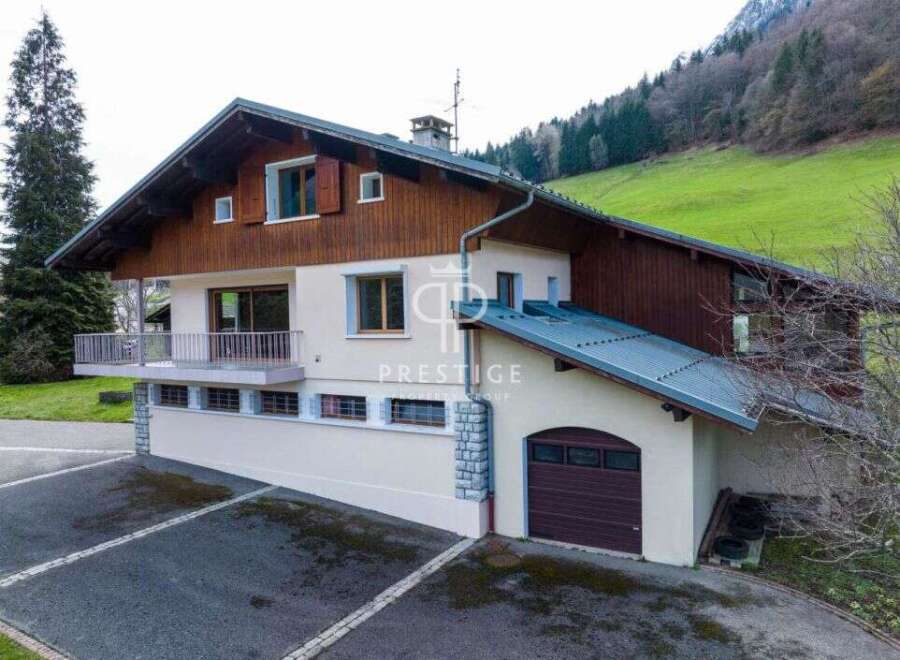 Discover a stunning property with a charming chalet-style design, perfect for those seeking a blend of elegance and comfort.