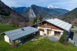 Discover a stunning property nestled in the heart of the mountains, offering breathtaking views and a serene atmosphere.