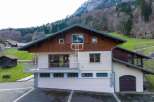 Discover a stunning property nestled in a picturesque mountain setting.