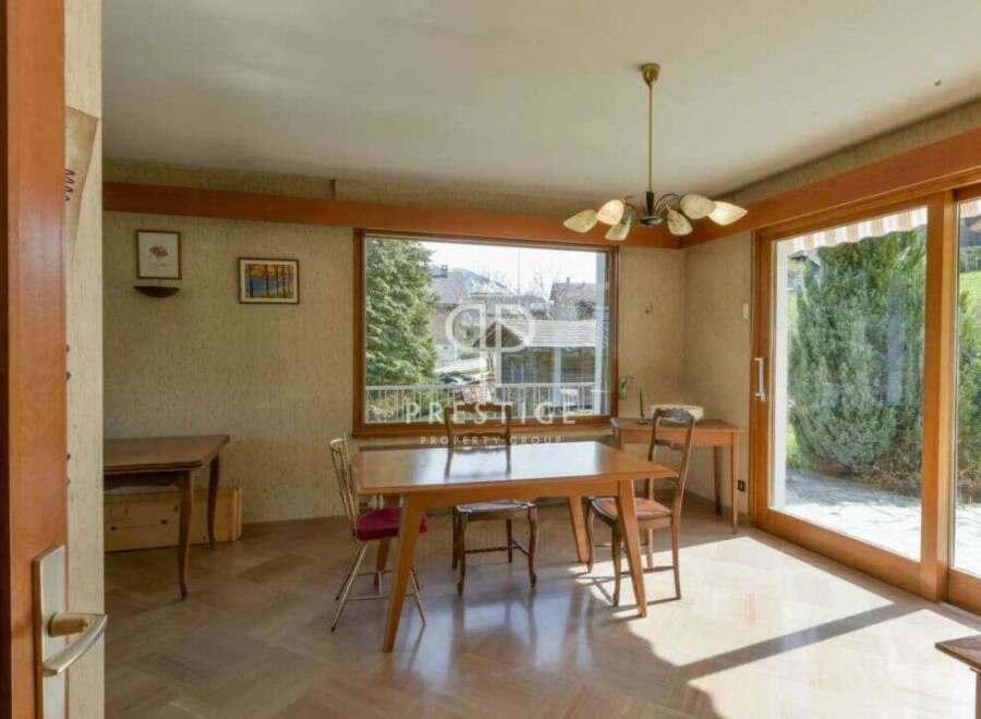 Discover a charming dining area bathed in natural light, perfect for intimate gatherings.