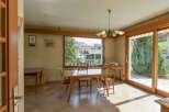 Discover a charming dining area bathed in natural light, perfect for intimate gatherings.