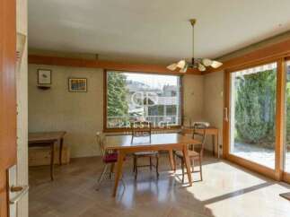 Discover a charming dining area bathed in natural light, perfect for intimate gatherings.