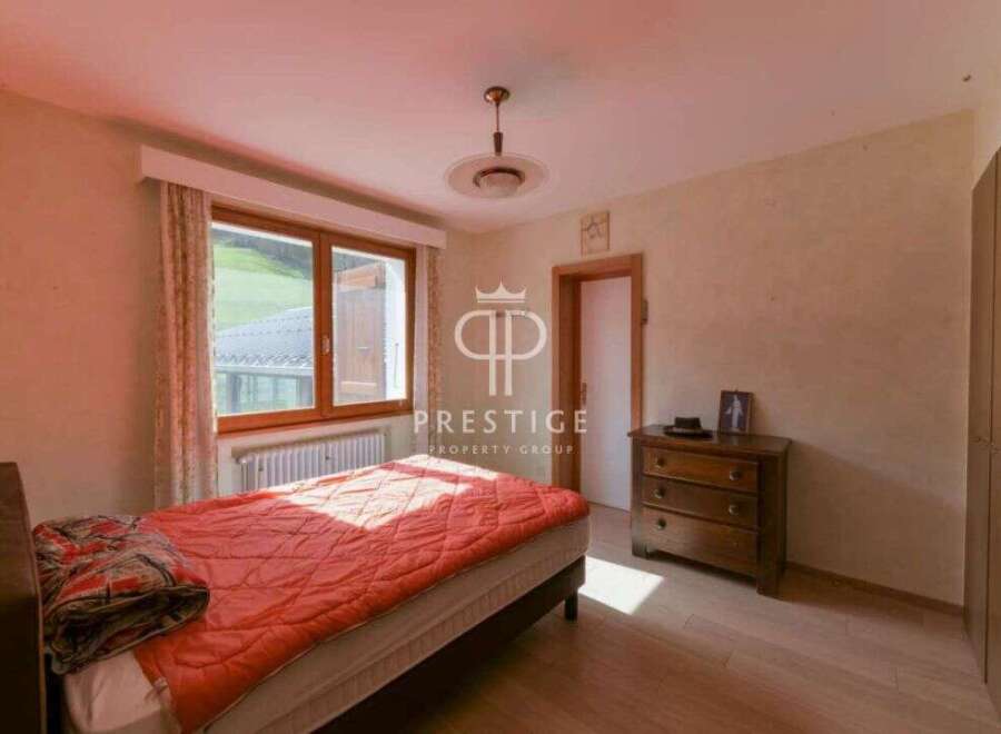 Discover a cozy bedroom with a stunning view.
