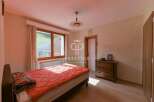 Discover a cozy bedroom with a stunning view.