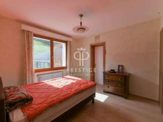 Discover a cozy bedroom with a stunning view.