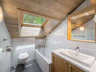 Discover the charm of this unique bathroom, featuring a skylight that floods the space with natural light.