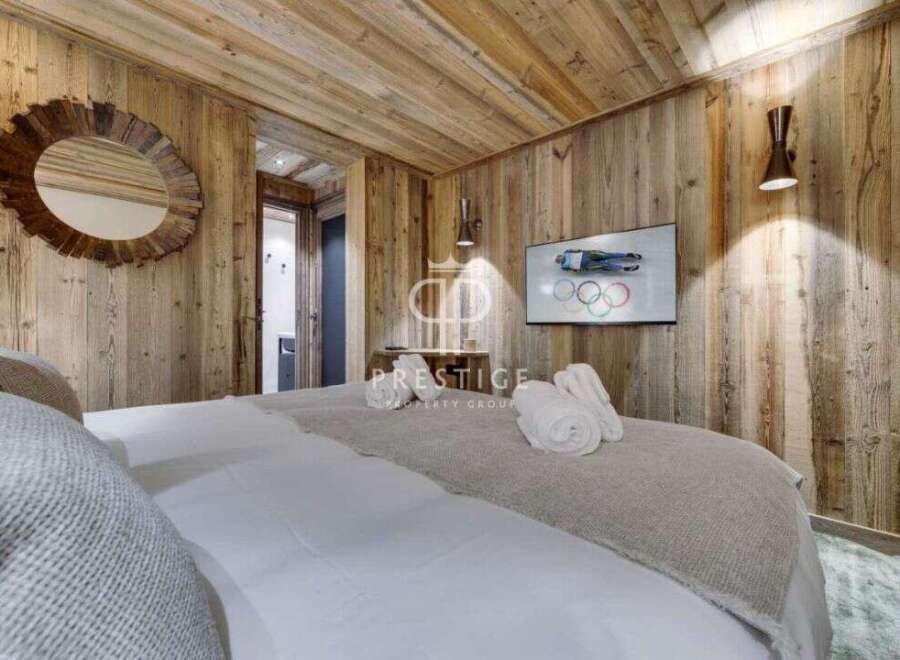 Experience rustic luxury in this stunning bedroom.