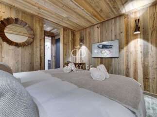Experience rustic luxury in this stunning bedroom.